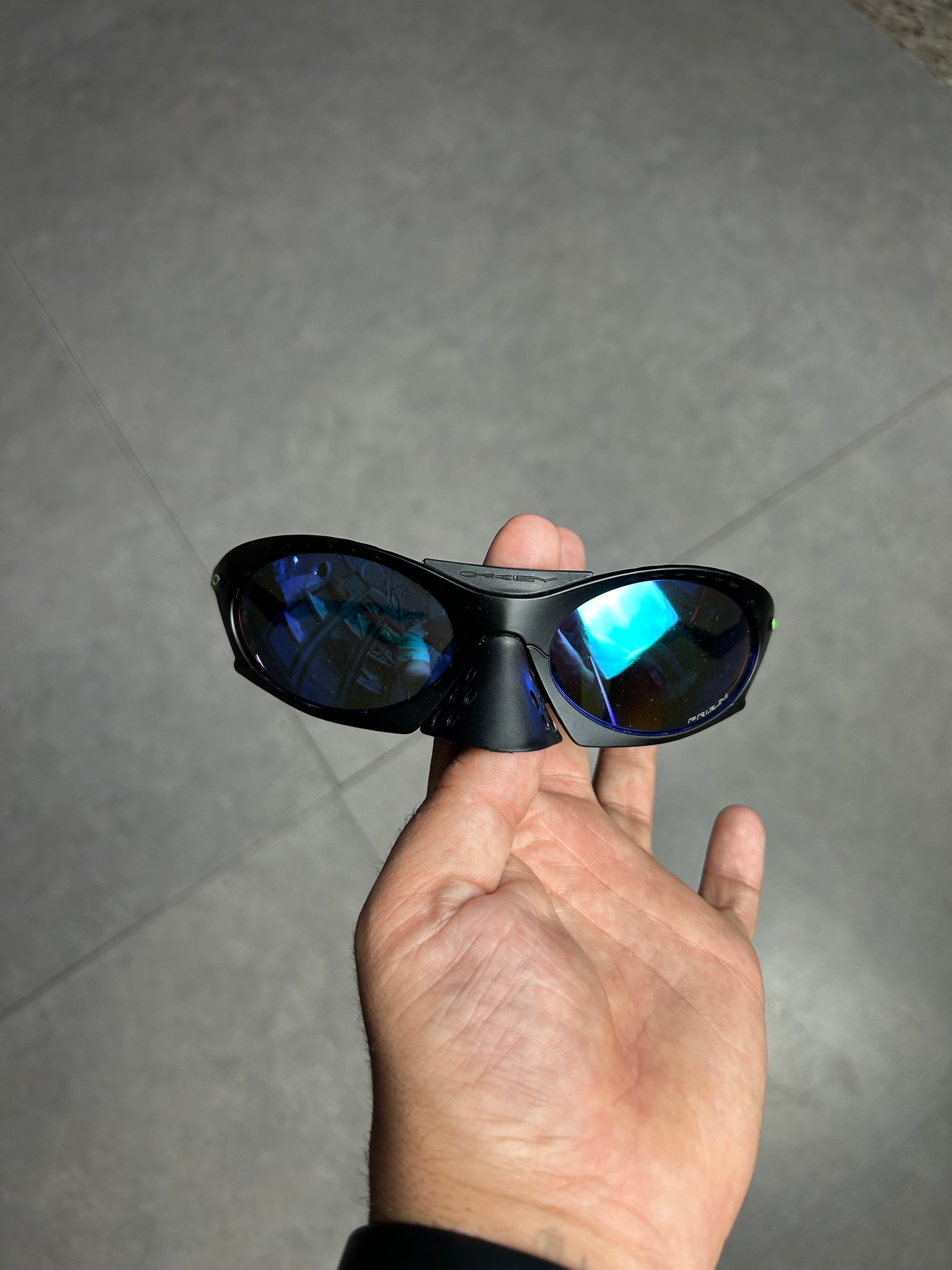 Oakley Plantaris – Black Matte | Lente Polarizada Ice Blue